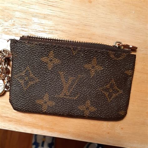 louis vuitton change pouch.